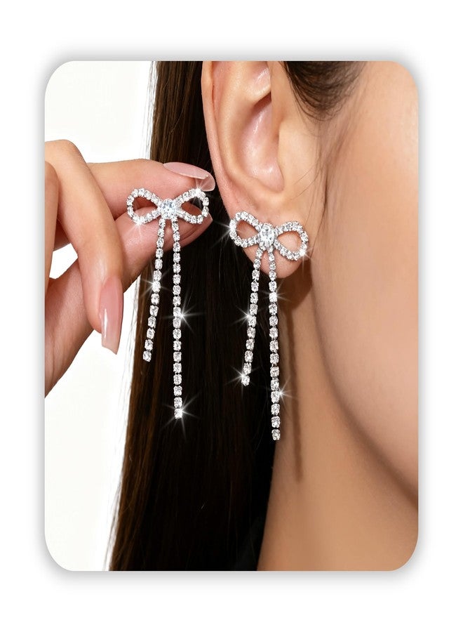 DAYANEY New Year Bow Earrings Silver Rhinestone Earrings Dangling,Sparkly Silver Drop Earring Rhinestone Bow Earring as New Years Jewelry, Ribbon Earings as Wedding Statement Earing Jewelry for Women - Image 1
